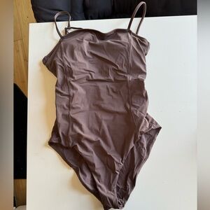 Vuori one piece. Color dune, size small. Worn once!